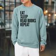 Eat Sleep Read Books Repeat Book Reader Raglan Sleeve Sweatshirt Cardinal