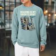 Football Skeleton Reading On Book Stack Raglan Sleeve Sweatshirt Cardinal