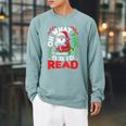 What Fun It Is To Read Books Christmas Santa Reading Books Raglan Sleeve Sweatshirt Cardinal