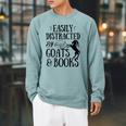 Goat Quote Easily Distracted By Goats And Books Lover Raglan Sleeve Sweatshirt Cardinal