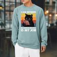 I'm Retired Reading Books Is My Job Cat Reader Raglan Sleeve Sweatshirt Cardinal