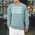 Never Judge A Book By Its Movie Raglan Sleeve Sweatshirt Cardinal