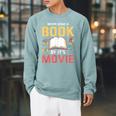 Never Judge A Book By It's Movie Reading Raglan Sleeve Sweatshirt Cardinal