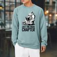 Just One More Chapter Book Skeleton Reading Books Raglan Sleeve Sweatshirt Cardinal
