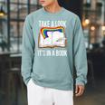 Take A Look It's In A Book Rainbow Bookworm And Book Lover Raglan Sleeve Sweatshirt Cardinal