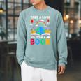 Take A Look It's In A Book Reading Vintage Retro Rainbow Raglan Sleeve Sweatshirt Cardinal