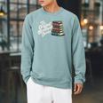 The Original Handheld Device Book Fair Book Lover Raglan Sleeve Sweatshirt Cardinal