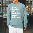 Read Books Lift Weights Fight Fascists Bookish Quote Raglan Sleeve Sweatshirt Cardinal