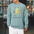 We Read At Dawn Bookish Frog Reading Raglan Sleeve Sweatshirt Cardinal