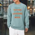 Stop Texting Me I'm Listening To A Book Audiobook Raglan Sleeve Sweatshirt Cardinal
