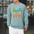 Summer Reading 2026 Dinosaurs Book Lover Unearth A Story Raglan Sleeve Sweatshirt Cardinal Summer Reading 2026 Dinosaurs Book Lover Unearth A Story Raglan Sleeve Sweatshirt Cardinal