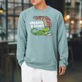 Summer Reading 2026 Unearth a Story Theme Dinosaur Book Nerd Raglan Sleeve Sweatshirt Cardinal