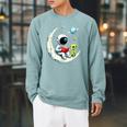 UFO Alien Astronaut Reading Book In Space Raglan Sleeve Sweatshirt Cardinal UFO Alien Astronaut Reading Book In Space Raglan Sleeve Sweatshirt Cardinal