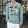 Never Underestimate An Old Lady Who Loves Books And Wine Raglan Sleeve Sweatshirt Cardinal Never Underestimate An Old Lady Who Loves Books And Wine Raglan Sleeve Sweatshirt Cardinal