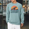 Unearth A Story Dinosaur Reader Book Lover 2026 Raglan Sleeve Sweatshirt Cardinal