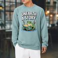Unearth a Story Frog Reading a Book Summer 2026 Premium Tri-Blend Raglan Sleeve Sweatshirt Cardinal Unearth a Story Frog Reading a Book Summer 2026 Premium Tri-Blend Raglan Sleeve Sweatshirt Cardinal