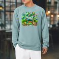 Unearth a Story Library Summer Reading 2026 Dinosaur Book Raglan Sleeve Sweatshirt Cardinal