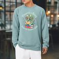 Unearth a Story Summer Reading 2026 Cute Dinosaur Book Lover Raglan Sleeve Sweatshirt Cardinal