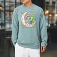 Women's Astronaut Reading Book With Alien Moon Space Astronomy Raglan Sleeve Sweatshirt Cardinal