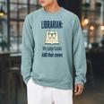 Women's We Judge Books And Their Covers Raglan Sleeve Sweatshirt Cardinal