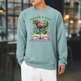 Women's Unearth A Story Summer Reading 2026 Dinosaur Book Floral Raglan Sleeve Sweatshirt Cardinal