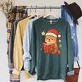 Cute Christmas Book Otter Reading Snowy Holiday Story Raglan Sleeve Sweatshirt Heather Blue Lagoon