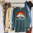 Unearth a Story Summer Reading 2026 Vintage Book Rainbow Raglan Sleeve Sweatshirt Heather Blue Lagoon Unearth a Story Summer Reading 2026 Vintage Book Rainbow Raglan Sleeve Sweatshirt Heather Blue Lagoon
