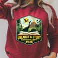 2026 Summer Reading Unearth a Story Teachers Students Book Raglan Sleeve Sweatshirt Heather Dust