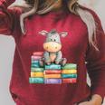 Adorable Donkey With Heart Sitting On Colorful Book Stack Raglan Sleeve Sweatshirt Heather Dust