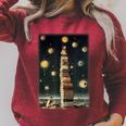Astrologist Sitting On The Tower Of Stacked Up Books Starry Raglan Sleeve Sweatshirt Heather Dust
