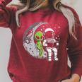 Astronaut Reading Book To Alien Moon Space Women Kids Men Premium Tri-Blend Raglan Sleeve Sweatshirt Heather Dust