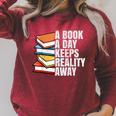 A Book A Day Keeps Reality Away Bookworm Raglan Sleeve Sweatshirt Heather Dust