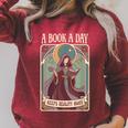 A Book a Day Keeps Reality Away Fairy Reading Tarot Card Raglan Sleeve Sweatshirt Heather Dust A Book a Day Keeps Reality Away Fairy Reading Tarot Card Raglan Sleeve Sweatshirt Heather Dust