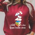 A Book A Day Keeps Reality Away Literature Reading Raglan Sleeve Sweatshirt Heather Dust