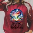 Book Dragon Reading Escaping Reality One Page Bookish Dragon Raglan Sleeve Sweatshirt Heather Dust