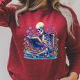 Bookish Skeleton Reading In Wildflowers Book Lover Bookworm Raglan Sleeve Sweatshirt Heather Dust
