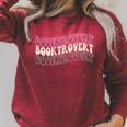 Booktrovert Groovy Read Books Avoid People & I Know Things Raglan Sleeve Sweatshirt Heather Dust Booktrovert Groovy Read Books Avoid People & I Know Things Raglan Sleeve Sweatshirt Heather Dust