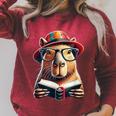 Capybara Bookworm Rodent Reading a Book Raglan Sleeve Sweatshirt Heather Dust