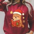 Cute Christmas Book Otter Reading Snowy Holiday Story Raglan Sleeve Sweatshirt Heather Dust