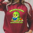 Cute Dino Book Lover Unearth A Story Summer Reading Raglan Sleeve Sweatshirt Heather Dust Cute Dino Book Lover Unearth A Story Summer Reading Raglan Sleeve Sweatshirt Heather Dust
