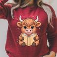 Cute Highland Cow Reading Book Raglan Sleeve Sweatshirt Heather Dust
