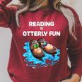Cute Otter Reading Book Two Otter Reading Is Otterly Fun Raglan Sleeve Sweatshirt Heather Dust Cute Otter Reading Book Two Otter Reading Is Otterly Fun Raglan Sleeve Sweatshirt Heather Dust