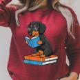 Dachshund Dog With Glasses Reading Book Librarian Raglan Sleeve Sweatshirt Heather Dust