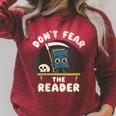 Don't Fear The Reader Kawaii Style Book Cartoon Raglan Sleeve Sweatshirt Heather Dust