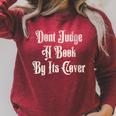 Don’t Judge a Book By Its Cover Tattoo Raglan Sleeve Sweatshirt Heather Dust