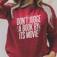 Don't Judge A Book By Its Movie Raglan Sleeve Sweatshirt Heather Dust Don't Judge A Book By Its Movie Raglan Sleeve Sweatshirt Heather Dust