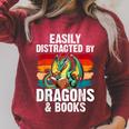 Dragon Reading Book Retro Vintage 80s Library Bookworm Raglan Sleeve Sweatshirt Heather Dust