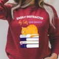 Easily Distracted Cats And Books Cute Cat Book Lover Raglan Sleeve Sweatshirt Heather Dust
