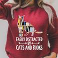 Easily Distracted By Cats And Books Reader Cat Lovers For Men Women Girls Kids Raglan Sleeve Sweatshirt Heather Dust