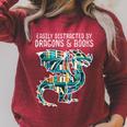 Easily Distracted By Dragons Books Bookworm Raglan Sleeve Sweatshirt Heather Dust Easily Distracted By Dragons Books Bookworm Raglan Sleeve Sweatshirt Heather Dust